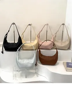 Minimalist faux leather hobo bags in six colors with pebble texture and adjustable straps