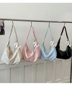 Modern minimalist hobo shoulder bags in four colors with cute horse charm detail