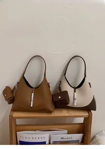 Lychee texture hobo bag set with metal buckle lock and matching mini coin purse detail