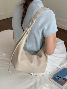 Minimalist beige soft leather Hobo bag with stylish knot strap and large capacity