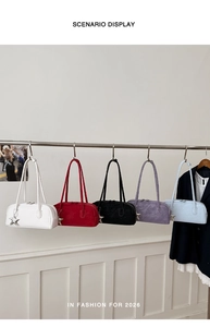 Detailed display of assorted colorful faux leather bowling bags with star charms