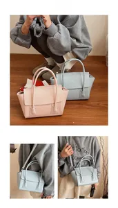 Chic Korean-style pink and blue crossbody handbags with round top handles and straps