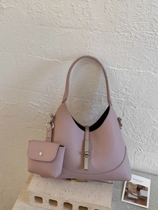 Pink lychee grain leather crescent handbag with silver buckle and small coin pouch