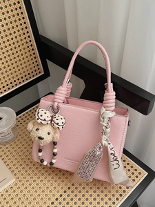 Pink lychee grain faux leather handbag with cute bear charm and silk scarf handle decor