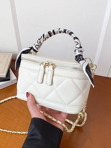 Mini quilted white leather handbag with silk scarf handle and golden chain strap