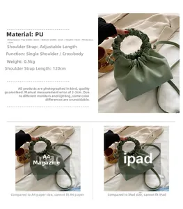 Detail view of bean green pleated bucket bag with PU leather texture and dimensions