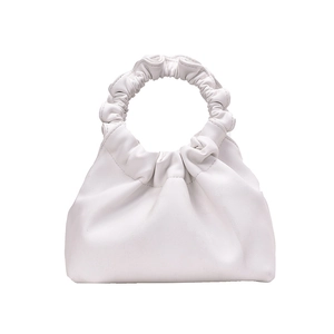 Minimalist white ruched dumpling bucket bag with scrunchie style handle in soft faux leather