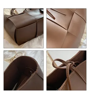 Détails du cabas tressé marron foncé avec poche intérieure zippée et fermoir magnétique pratique