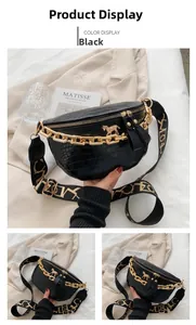 Close-up of black faux crocodile leather bag with gold acrylic chain and logo