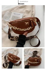 Detail of brown crocodile pattern crossbody bag with gold horse buckle and chunky chain