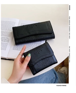 Details von Vintage-Brieftaschen aus PU-Leder mit lasergeschnittenem Blumenmuster