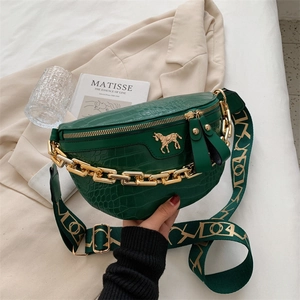 Green croc-effect crossbody bag with gold chain, unicorn logo and printed strap