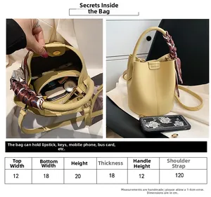 Detailed size chart and internal capacity layout for the lychee pattern leather bucket bag