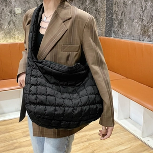 Quilted black puffer tote bag for women with large capacity and soft padded shoulder strap