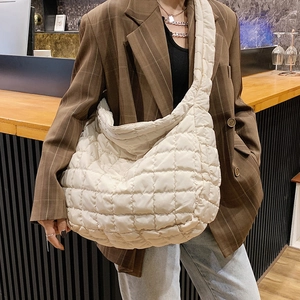 Quilted cream puffer tote bag with oversized silhouette for women's daily commute