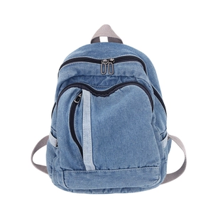 Classic washed denim backpack for women with light grey straps and front zip pocket