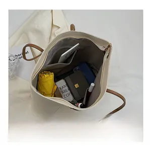 Detail view of large tote bag interior showing spacious compartments for daily essentials