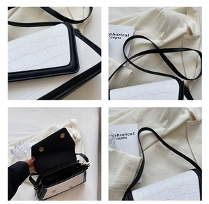 Detail of stone pattern crossbody bag with magnetic snap closure and inner pocket
