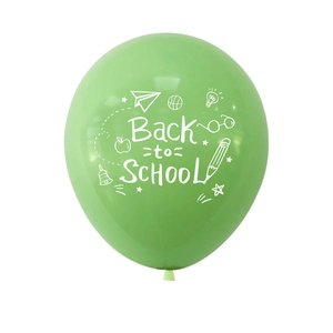 Detail of green Back to School balloon with white stationery and school doodles