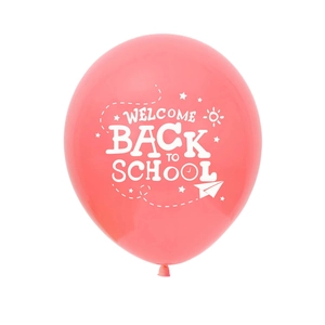 Pink latex balloon featuring white Welcome Back to School text with cute star patterns