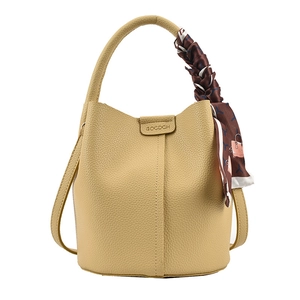 Yellow litchi grain leather bucket bag with printed silk scarf and adjustable strap