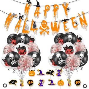 Macro view of Happy Halloween banner, orange balloons and themed cake toppers set