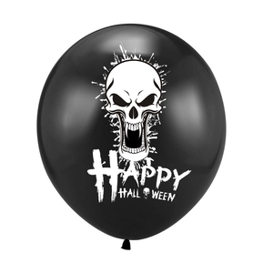 Detail of a black Halloween latex balloon featuring a white skull and festive lettering