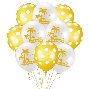 Detail of yellow polka dot and tropical palm tree print latex balloons with golden ribbons