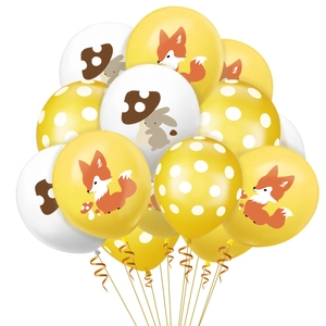 Detail of jungle animal balloons featuring foxes, bunnies and golden spiral ribbons
