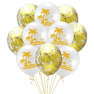 Close-up of tropical palm tree balloons and gold confetti balloons with metallic ribbons