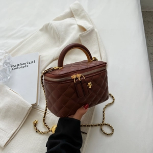 Brown quilted mini crossbody bag with gold chain strap and top handle for women
