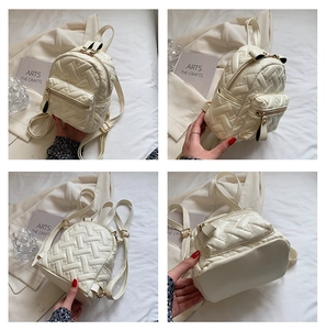 Detail view of cream quilted mini backpack showing front, side, and back textures