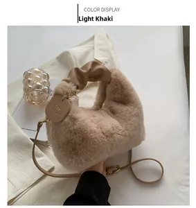 Detailed close-up of light khaki plush faux fur bag with soft texture and chic gold chain