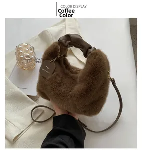 Detail of plush coffee brown faux fur tote with leather handle and round slogan tag