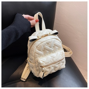 Chic quilted rhombus backpack with heart embroidery and bow detail in creamy white