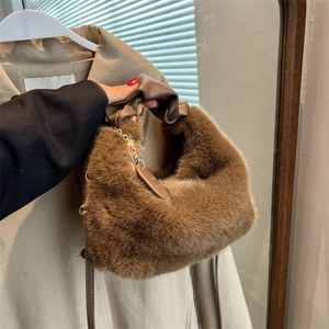 Faux fur handbag in dark brown with gold chain strap and faux leather handle for winter