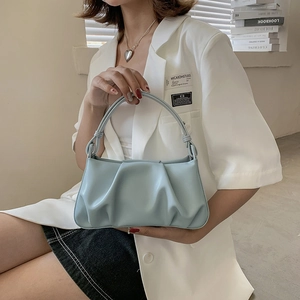 Chic light blue pleated cloud bag for women with stylish ruched design and handle