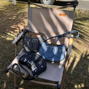 Y2K style baguette shoulder bags with silver studs in black, denim, and grey