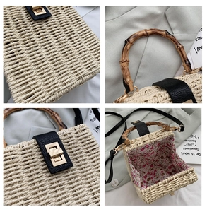 Detail of straw handbag featuring bamboo handle, golden metal lock, and floral lining