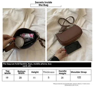 Size guide for vintage rivet shoulder bag showing dimensions and internal storage capacity