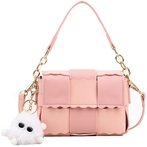 Pink woven leather crossbody bag with wave edge and cute plush monster charm