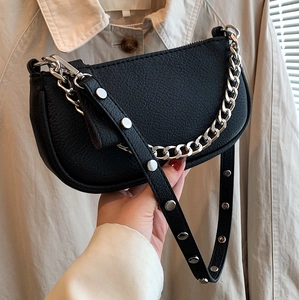 Retro black baguette bag with silver chain and studded leather shoulder strap