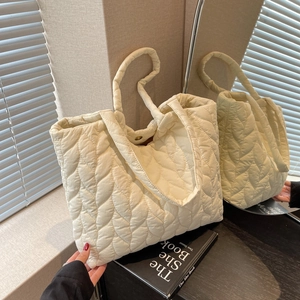 Chic beige quilted tote bag with leaf pattern and large capacity for daily use