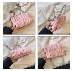 Multi-angle views of pink ruched cloud bag with sparkling rhinestone handles and chain