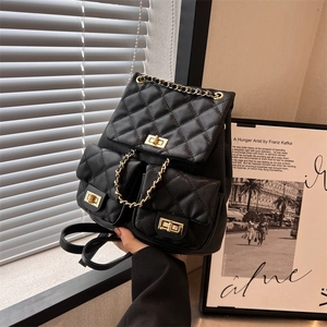 Chic black quilted backpack for women featuring caviar texture and gold chain straps