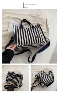 Detail view showing blue and white striped canvas tote bag with adjustable shoulder strap