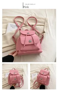 Detailed view of pink PU leather backpack with metal turn-lock and drawstring closure