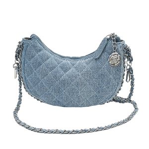 Quilted denim hobo bag with silver chain strap and rose pendant in light blue finish