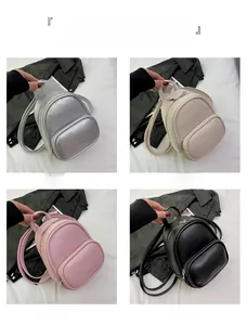 Mini PU leather backpack in four colors with front zipper pocket and fashion logo