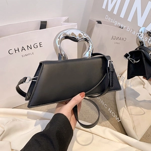 Black leather trapezoid handbag with creative liquid silver metal handle and shoulder strap